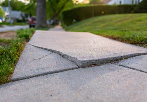 cracked sidewalk uneven small foundation problems