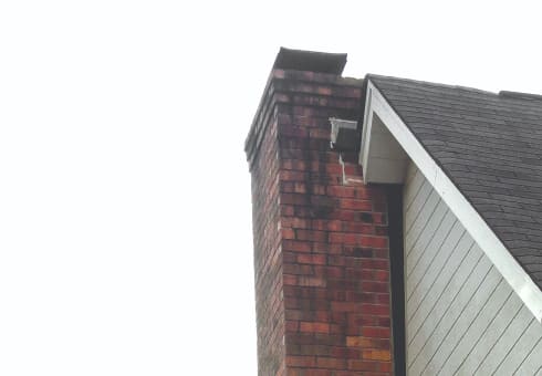 tilting chimney small foundation problems