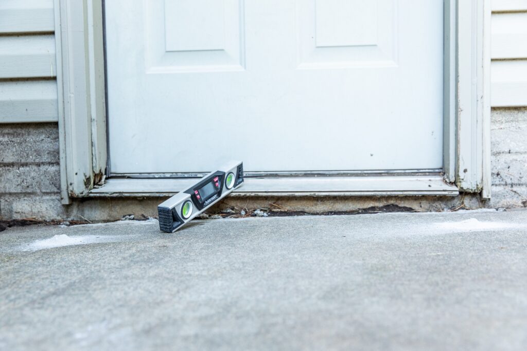 Concrete Repair for Sunken Garage Floor by Side Door