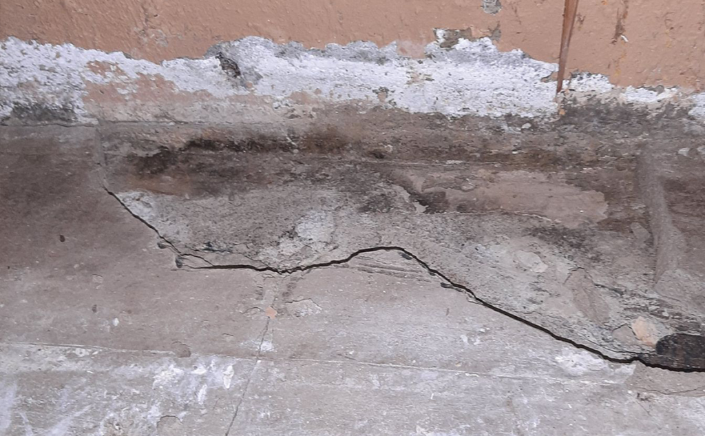 basement floor cracks e1723845203719 Why Your Basement Floor is Cracked